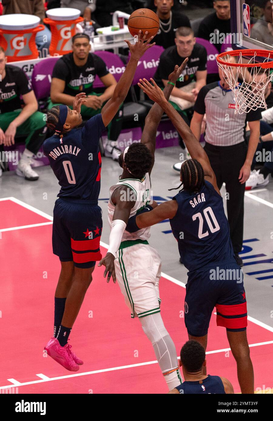 Washington, USA. 22nd Nov, 2024. WASHINGTON, DC - NOVEMBER 22: Boston Celtics center Neemias Queta (88) and Washington Wizards guard Bilal Coulibaly (0) go after a rebound during a NBA game between the Washington Wizards and the Boston Celtics, on November 22, 2024, at Capital One Arena, in Washington, DC. (Photo by Tony Quinn/SipaUSA) Credit: Sipa USA/Alamy Live News Stock Photo