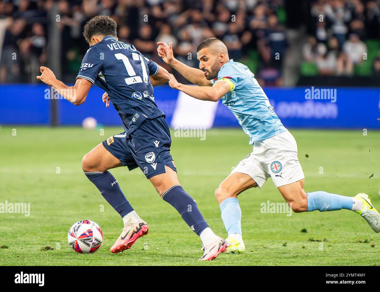 Melbourne City's Captain Aziz Behich (R) and Melbourne Victory's Nishan ...