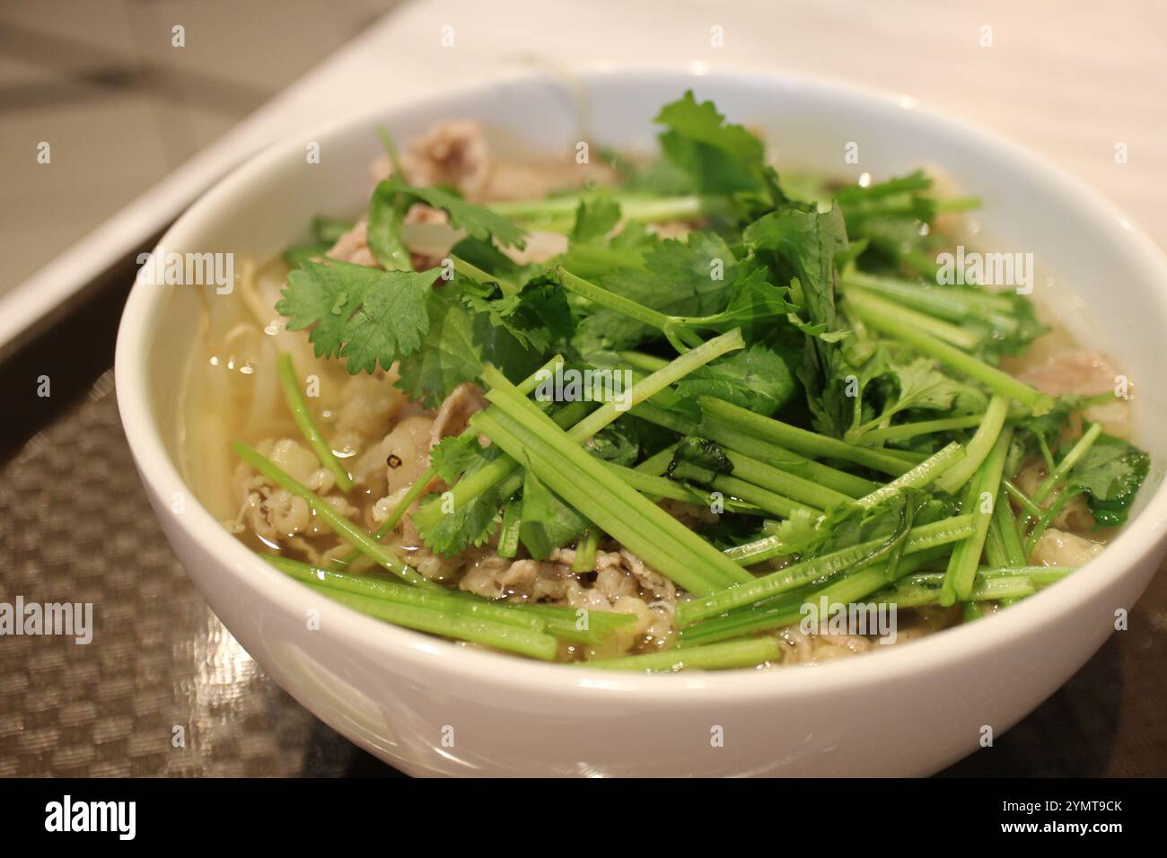 Vietnamese cuisine: pho bo (rice noodles with sliced beef and coriander ...