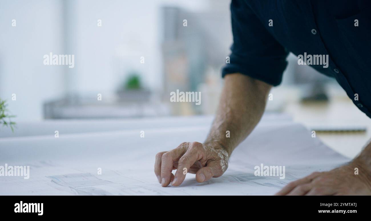 Blueprint, architecture and planning with hands of person in office for ...