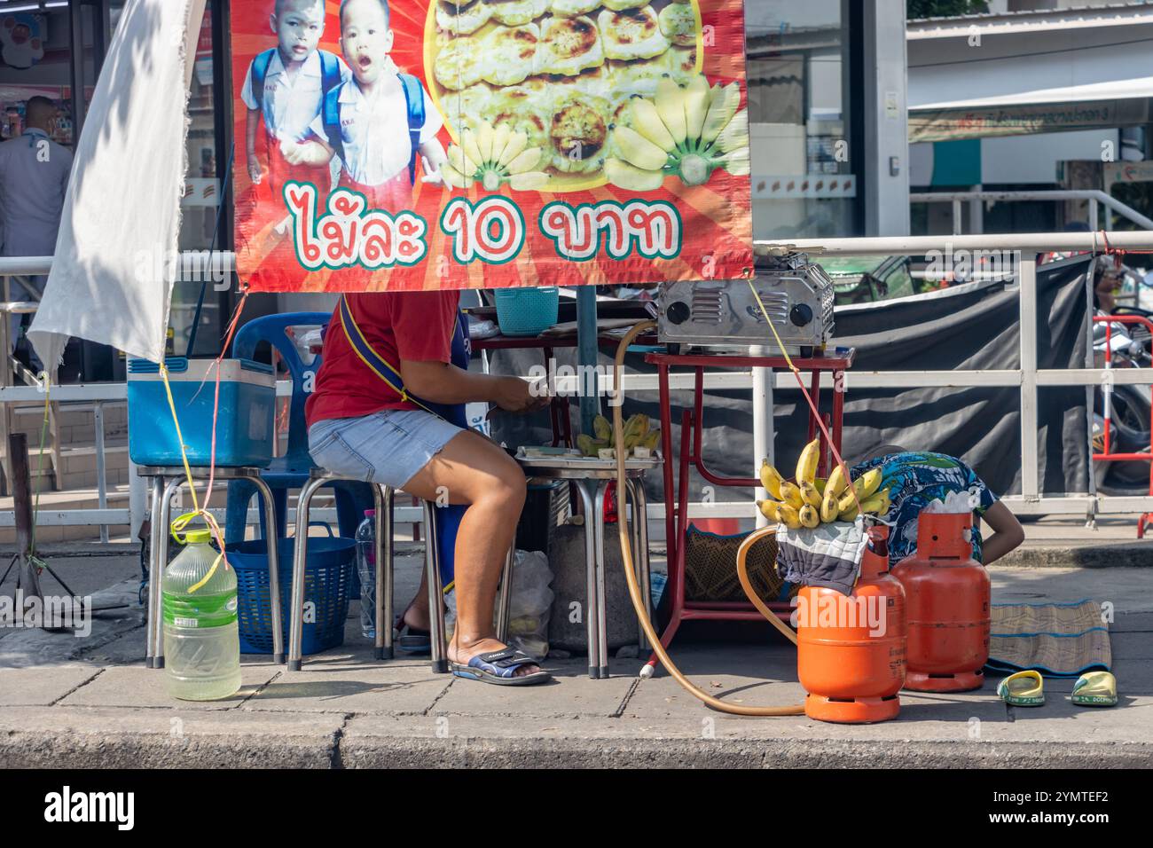 SAMUT PRAKAN, THAILAND, NOV 09 2024, Street sale of grilled banana Stock Photo