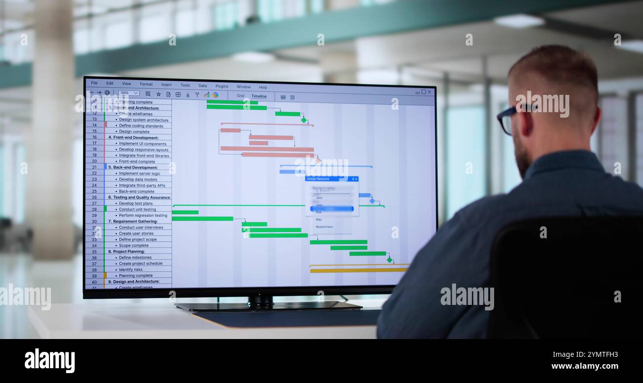 Project Management Software And Business Plan Schedule In Office Stock Photo