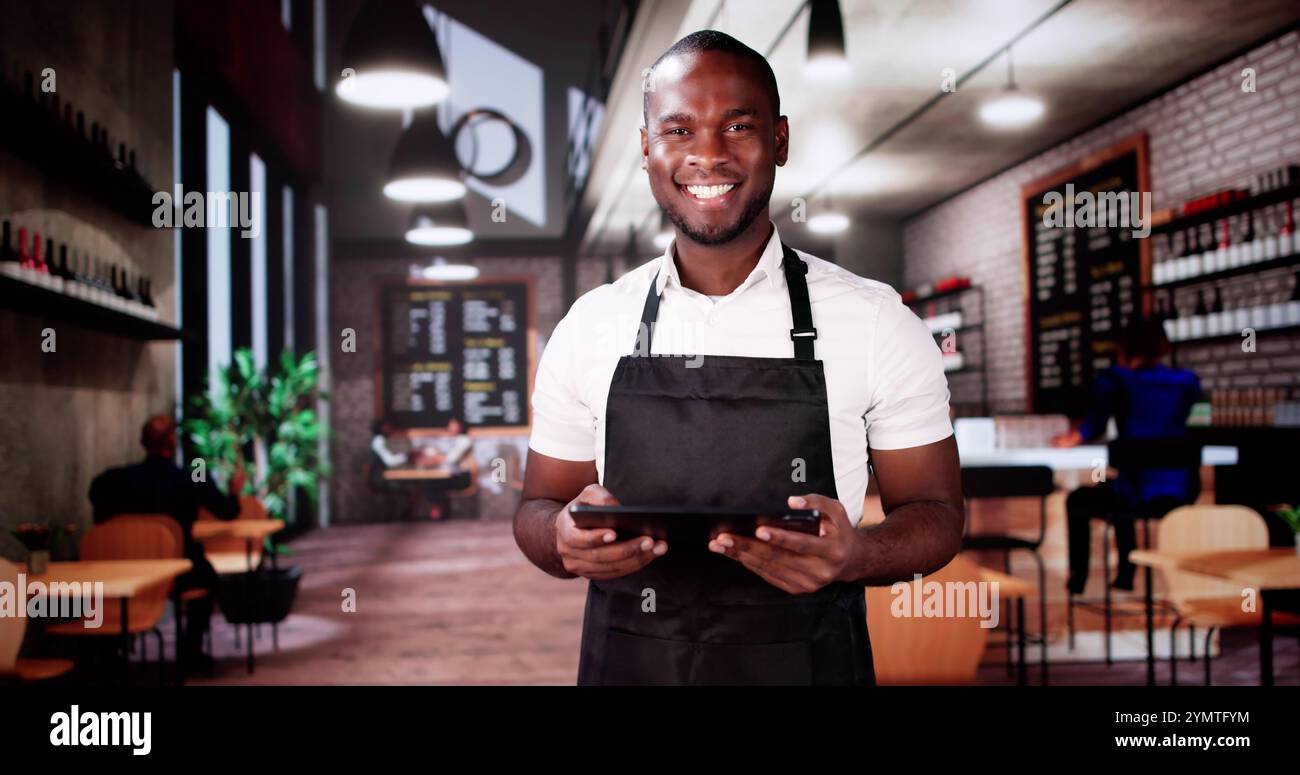 Restaurant Waiter With Tablet. Shop Owner With Vision Stock Photo - Alamy
