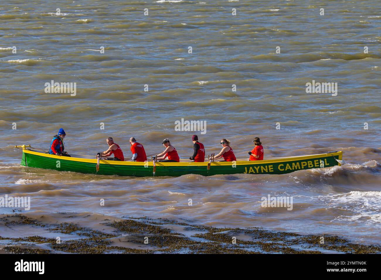 Pilot Gig racing on the Severn Estuary with choppy seas Stock Photo - Alamy