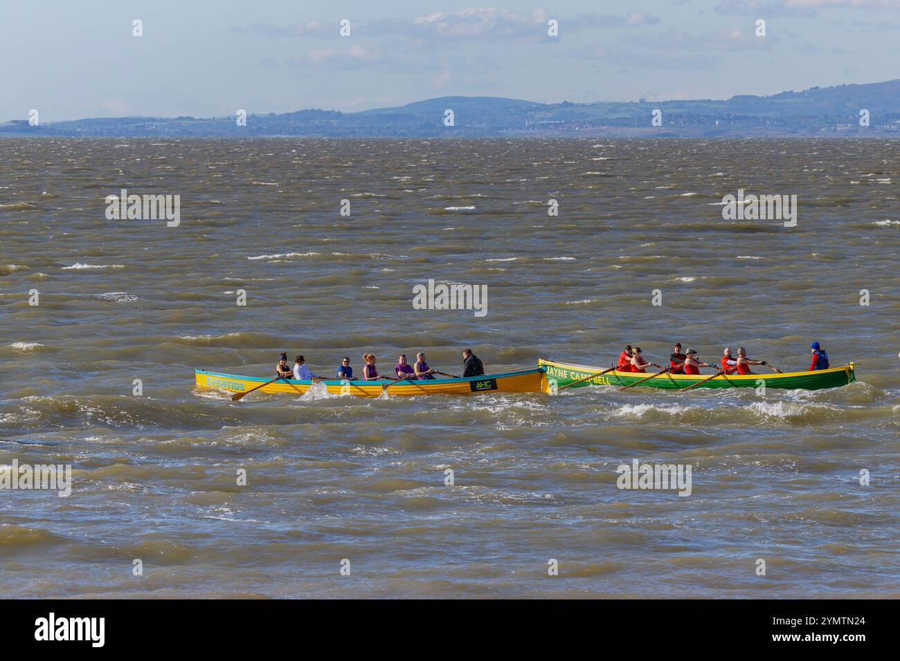 Pilot Gig racing on the Severn Estuary with choppy seas Stock Photo - Alamy
