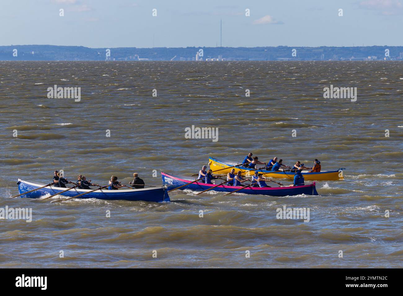 Pilot Gig racing on the Severn Estuary with choppy seas Stock Photo - Alamy