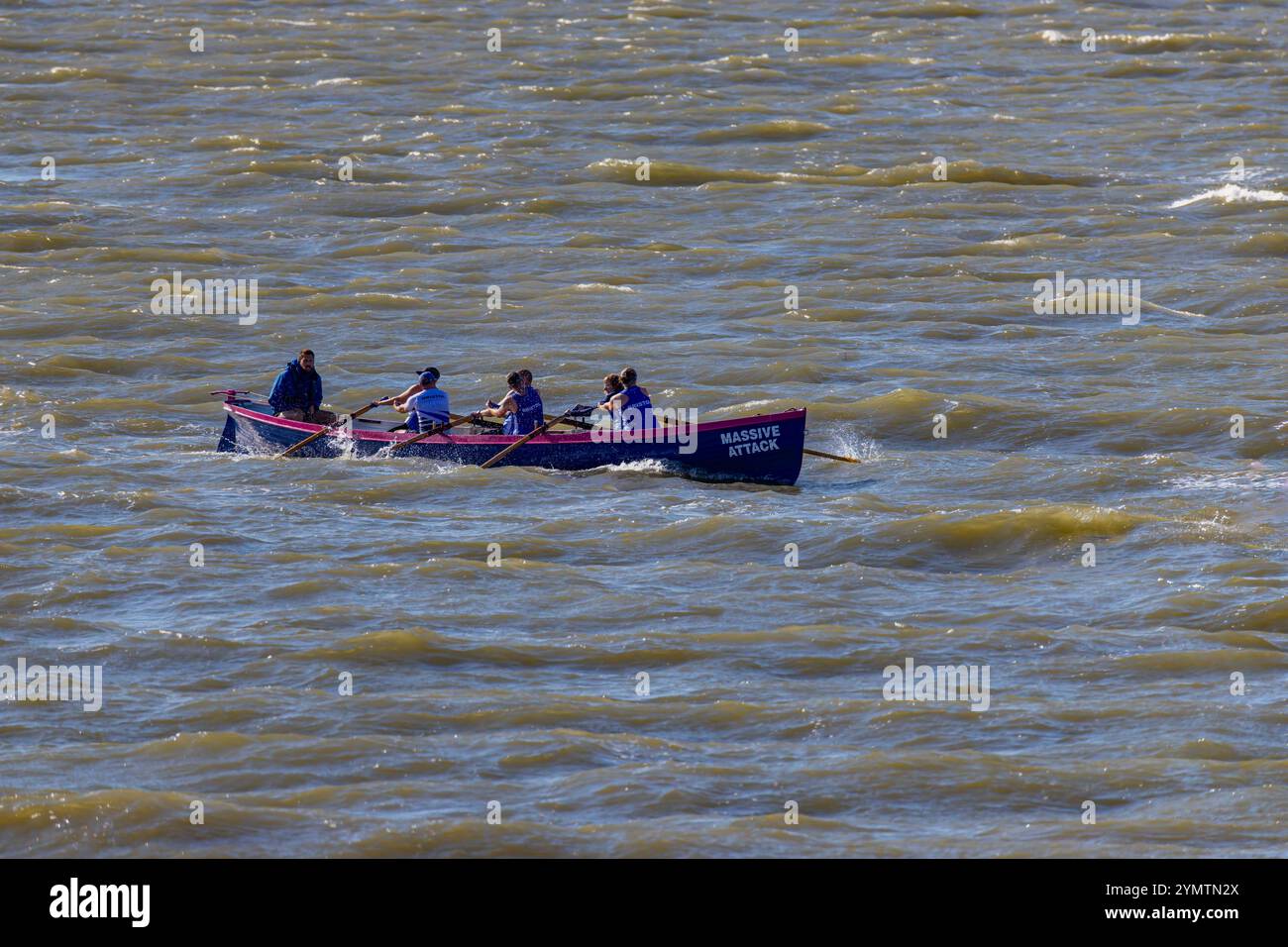 Pilot Gig racing on the Severn Estuary with choppy seas Stock Photo - Alamy