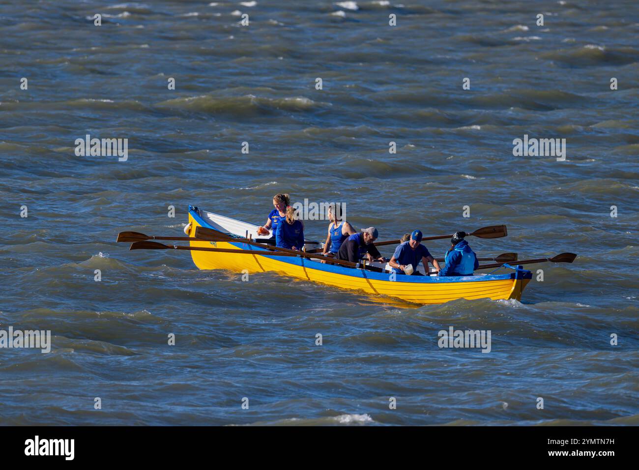 Pilot Gig racing on the Severn Estuary with choppy seas Stock Photo - Alamy