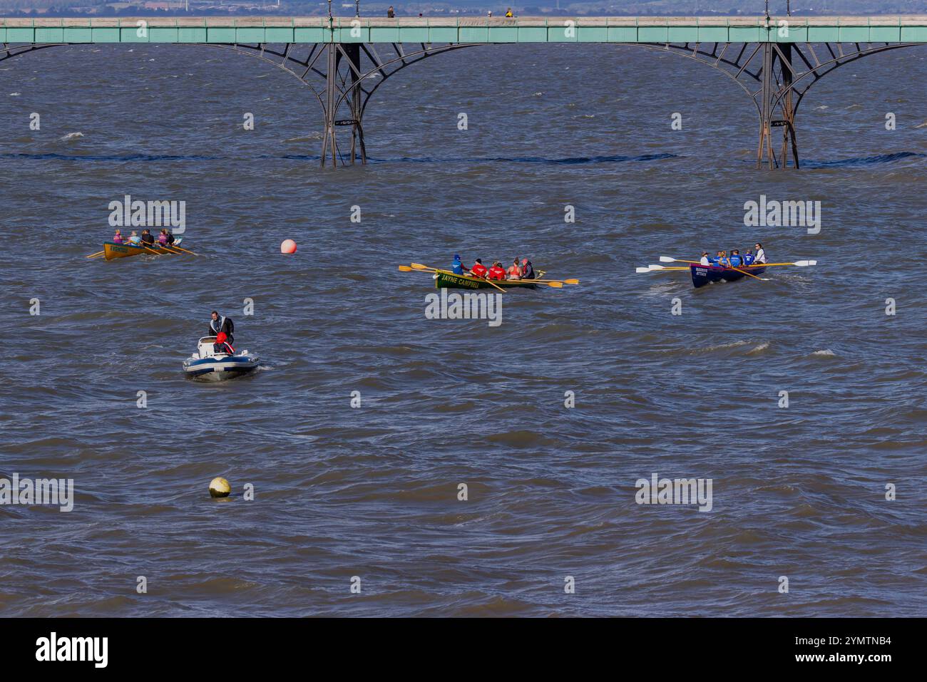 Pilot gig racing off Clevedon Beach with choppy sea Stock Photo - Alamy