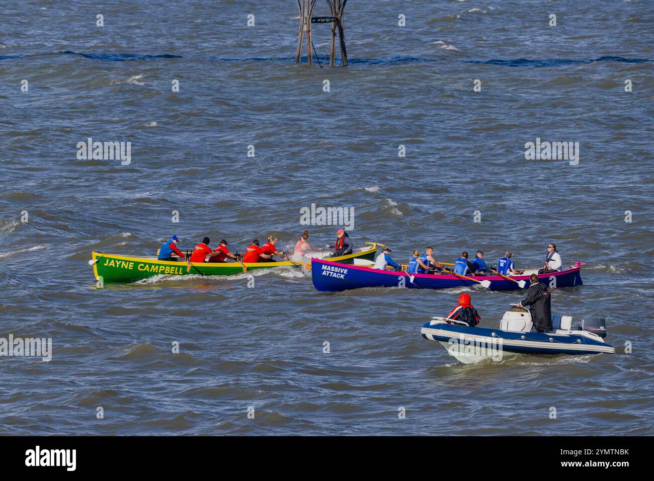 Pilot gig racing off Clevedon Beach with choppy sea Stock Photo - Alamy