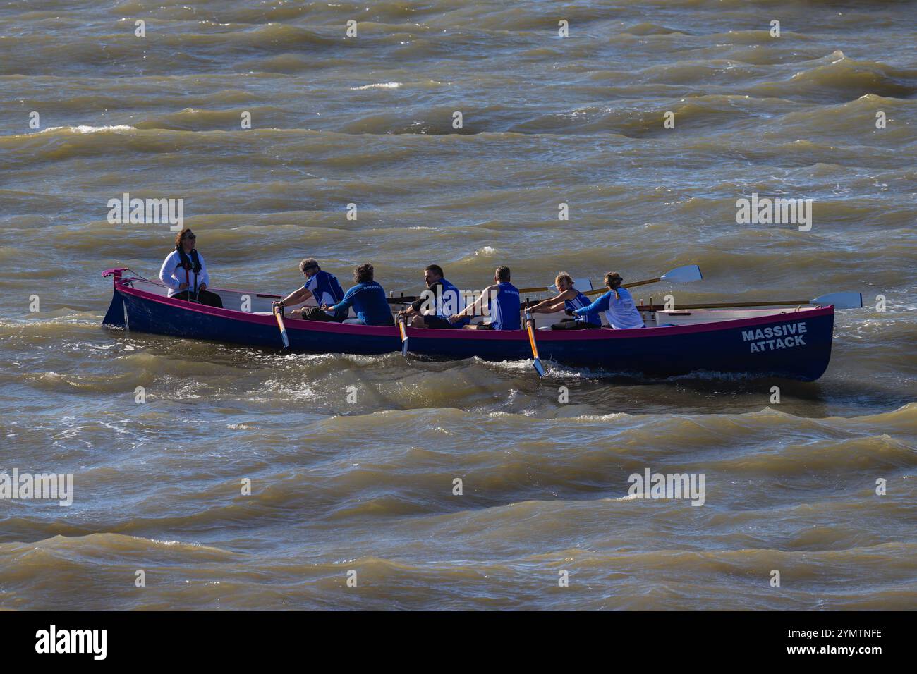 Pilot gig racing on the Severn Estuary with rough seas Stock Photo - Alamy