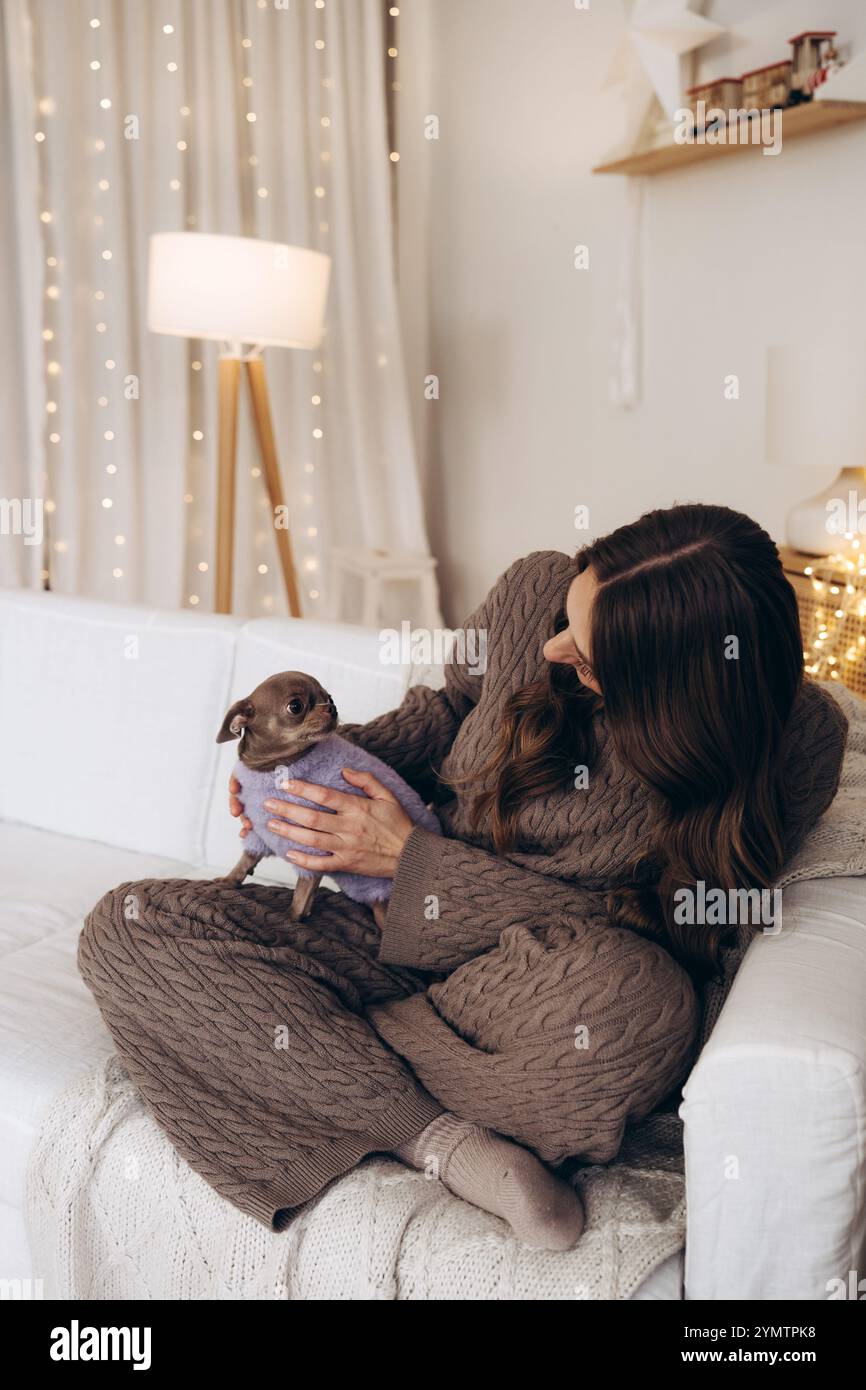 Woman Enjoying Cozy Moments with Stock Photo