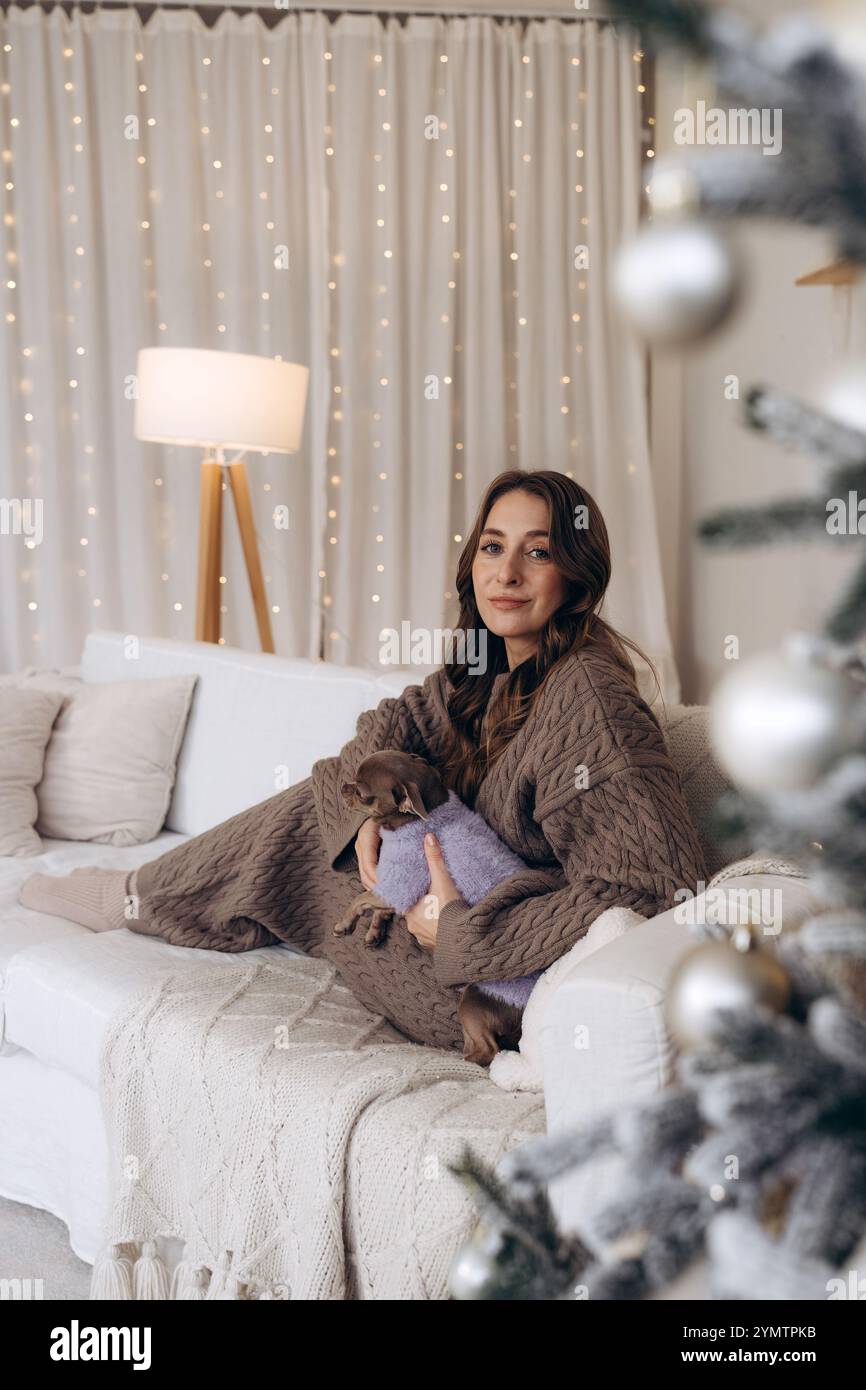 Woman Enjoying Cozy Moments with Stock Photo