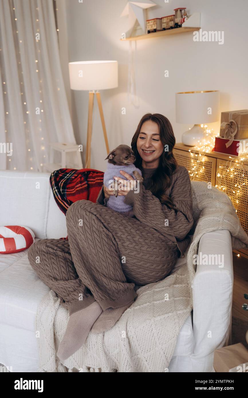 Woman Enjoying Cozy Moments with Stock Photo