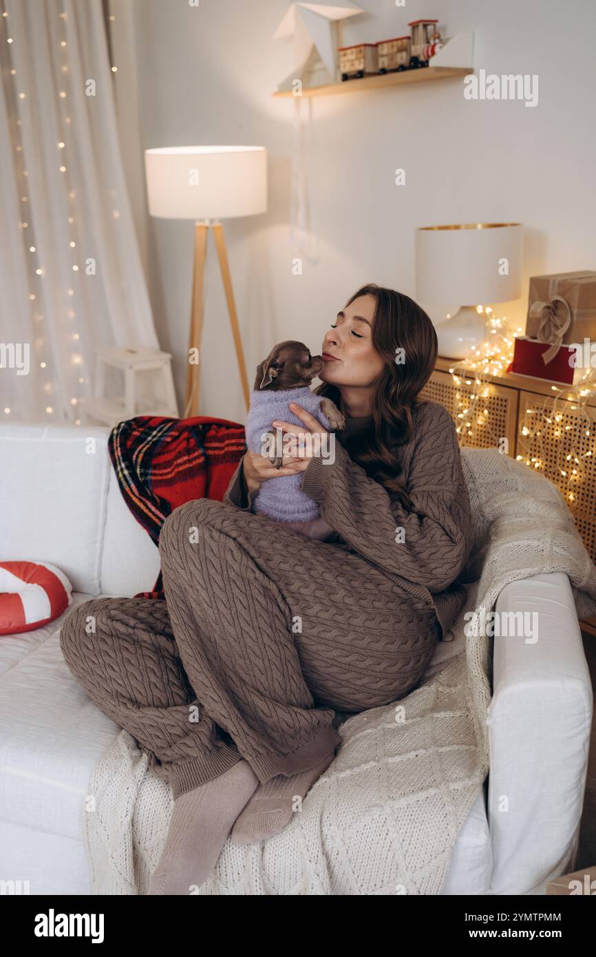 Woman Enjoying Cozy Moments with Stock Photo