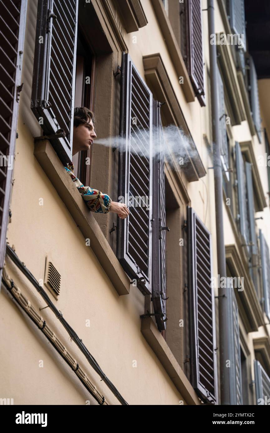 Balcony cigarette hi-res stock photography and images