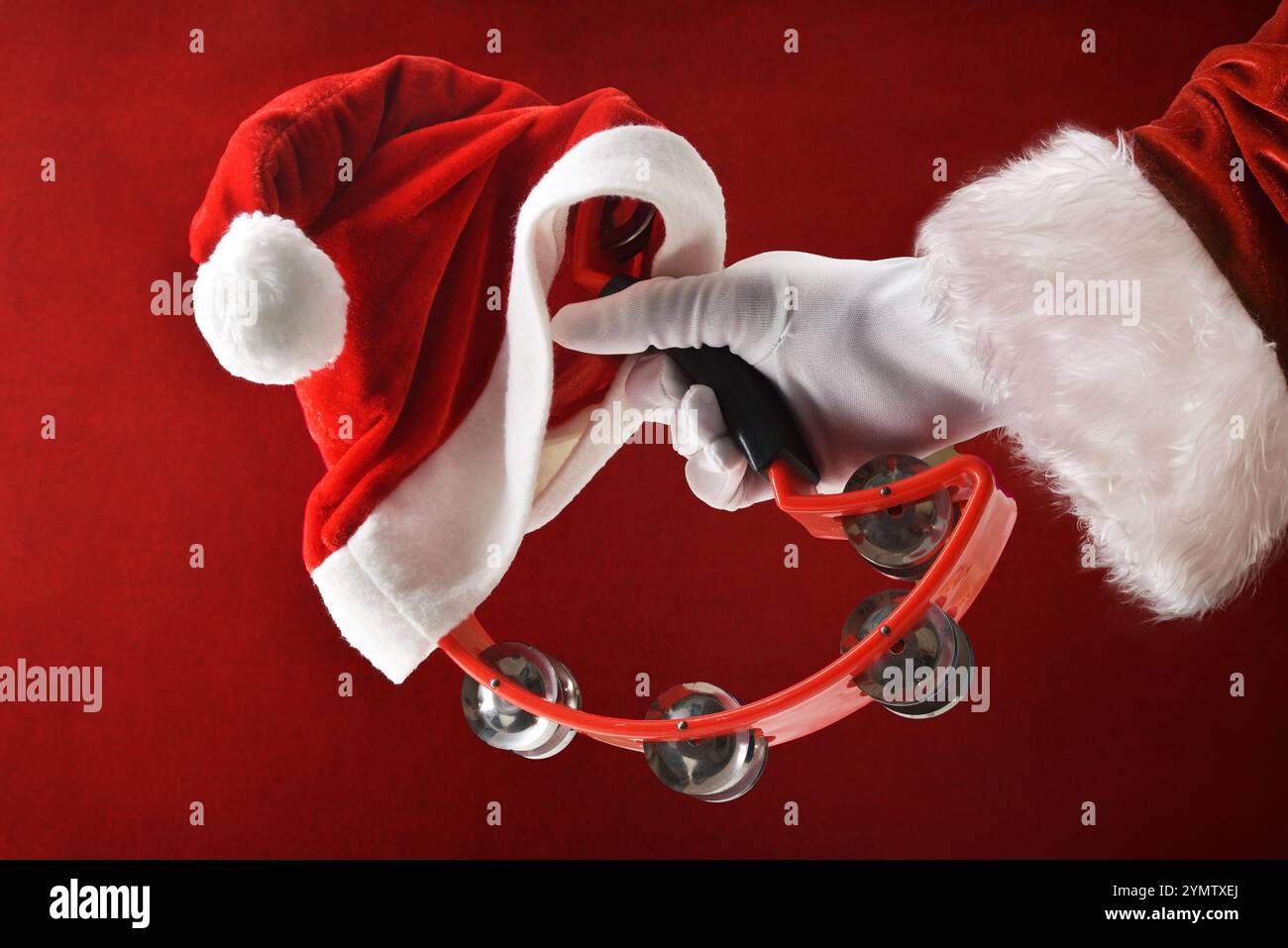 Santa's Instruments Red tambourine hand musical instrument hi-res stock photography and ...