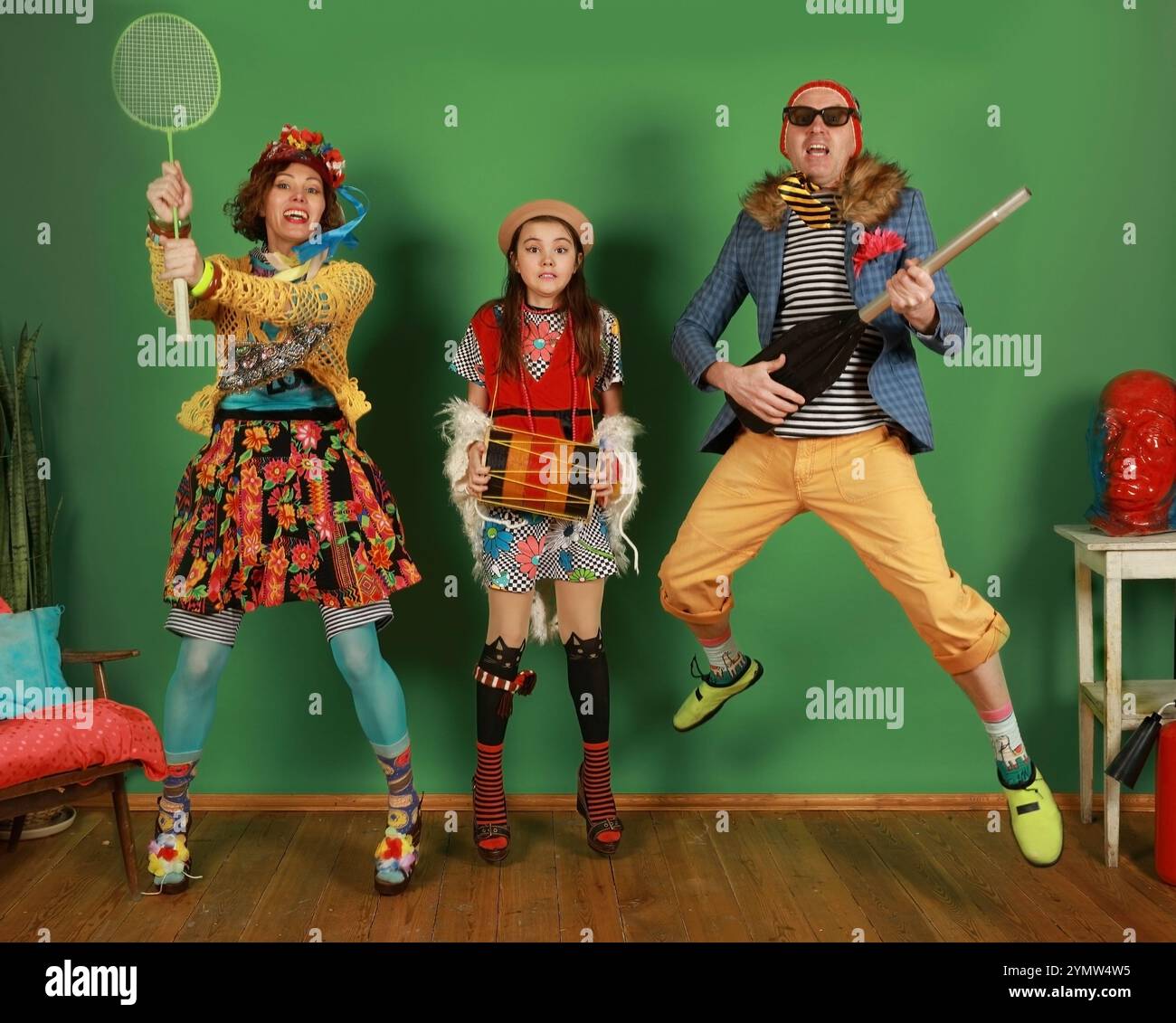 Freak Fun Jolly of freaks consisting of mom, dad and daughter having fun in the ...