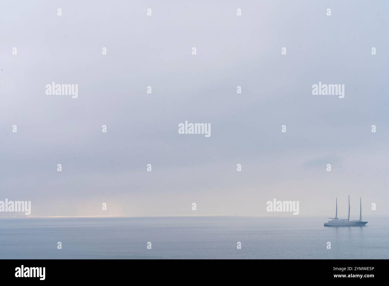 Big ship sailing in the sea, alone on the horizon line. Stock Photo