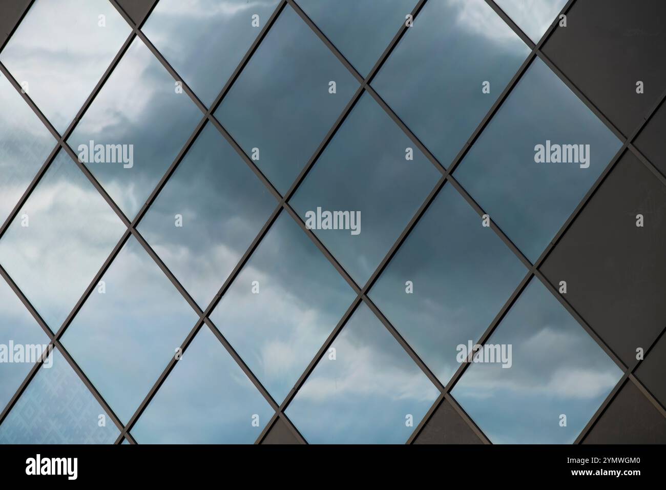 Windows with cloudy sky reflection Stock Photo - Alamy