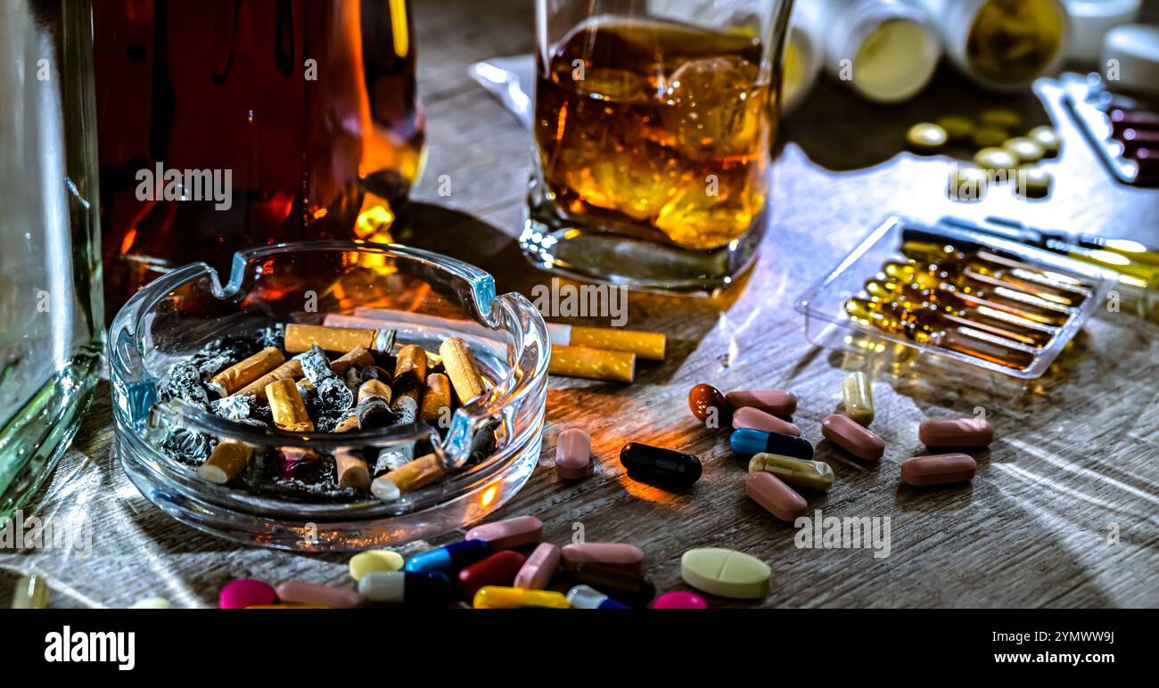 Addictive substances, including alcohol, cigarettes and drugs. Stock Photo