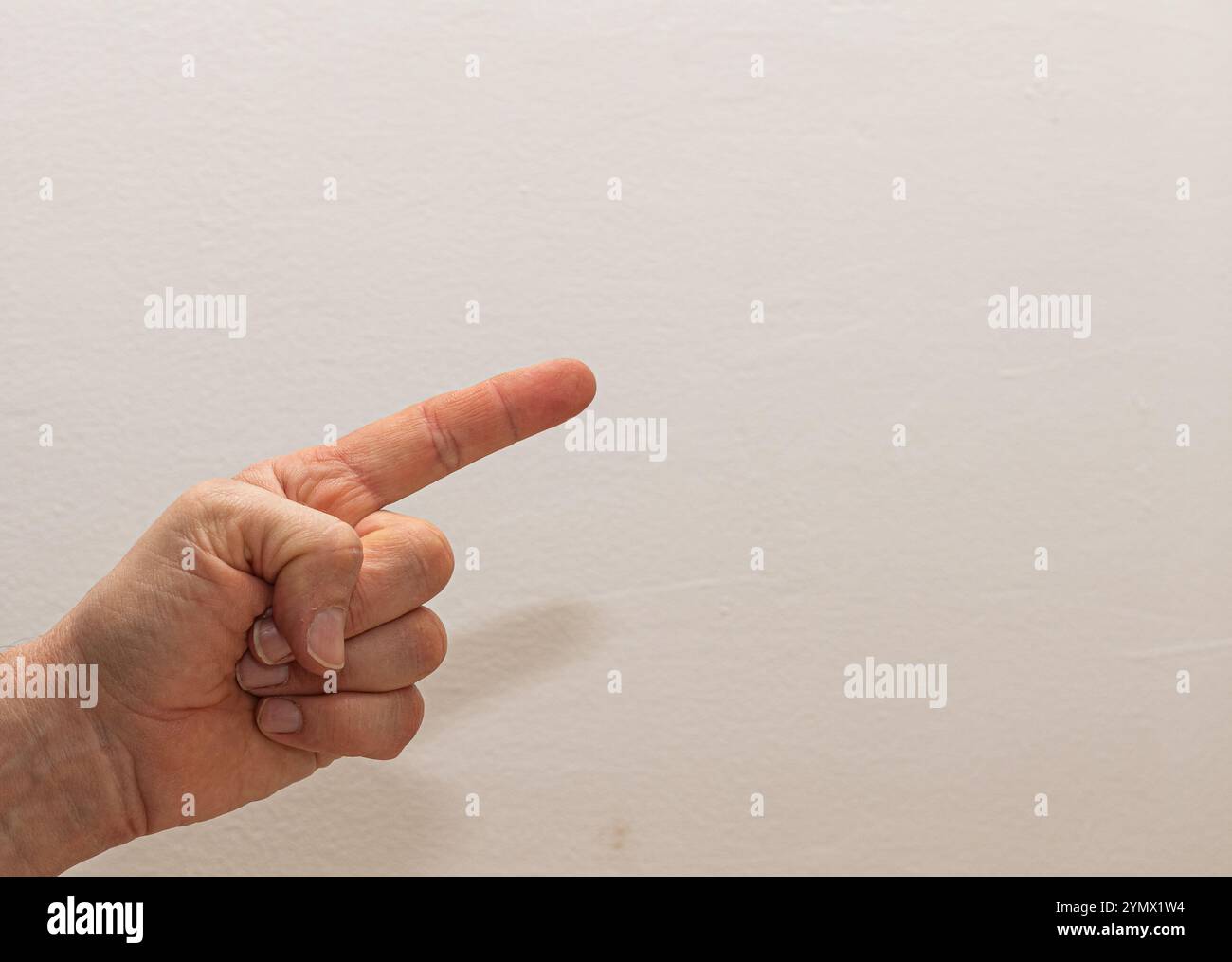 Single hand with index finger pointing right, offering ample space for ...