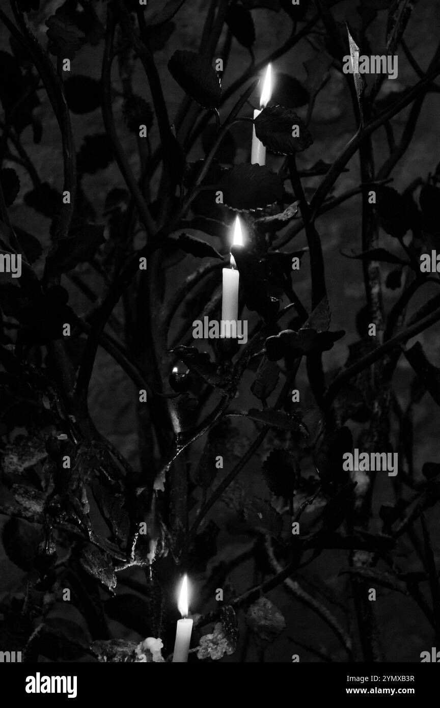 OXFORD, UK - AUGUST 23, 2017: Candle tree. Interior detail in Cathedral of Christ Church college at University of Oxford in England. Black white photo Stock Photo