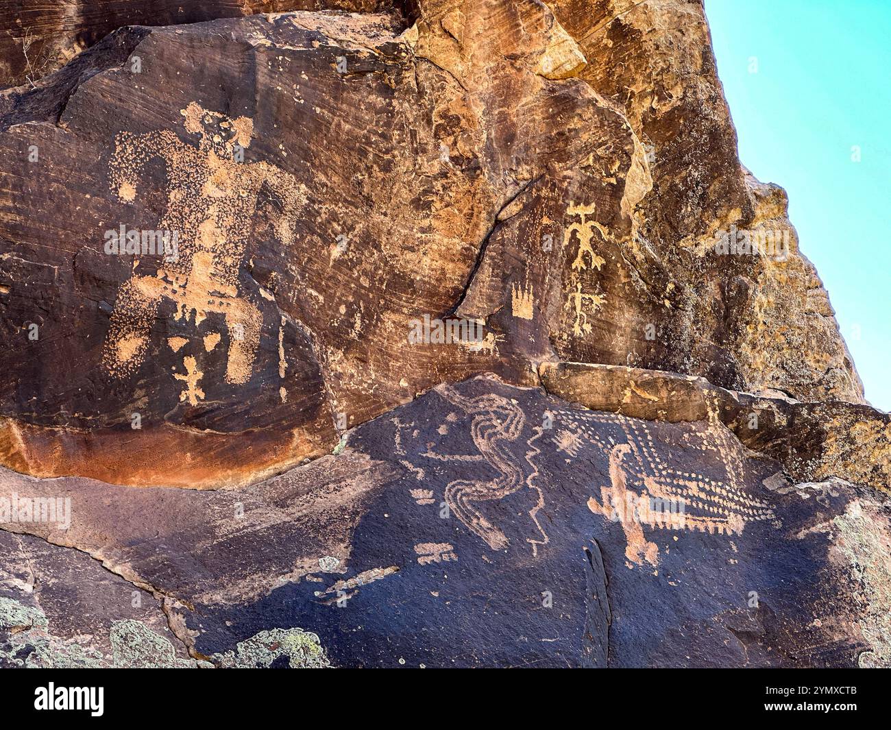 Mother of Game Birthing Scene Petroglyphs at Rock Art Ranch in Winslow, Arizona, USA - Smartphone Captured Stock Image