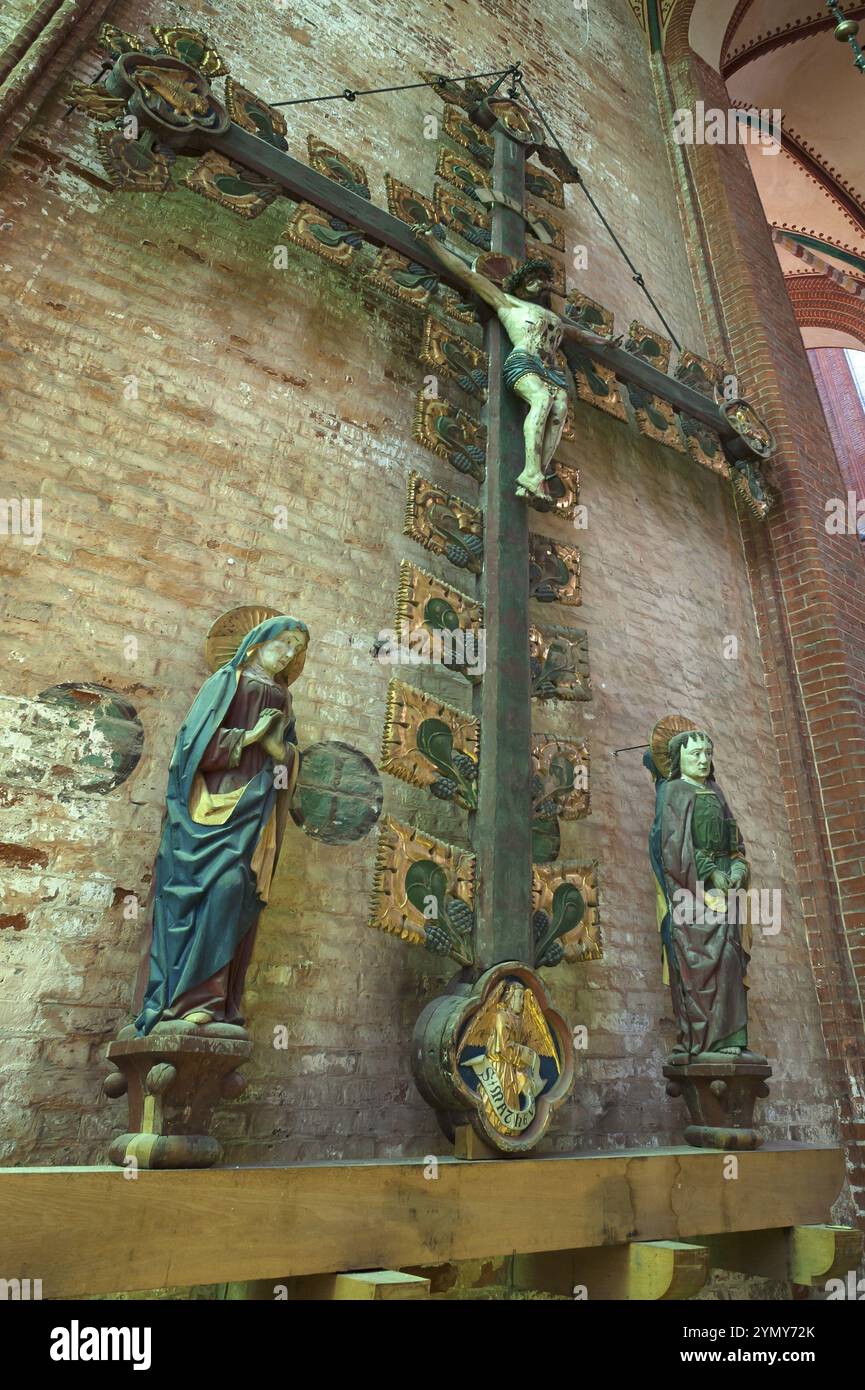Triumphal cross group from St Georgen 1420, St Nikolai Church, late Gothic brick building, built between 1381 and 1487, Wismar, Mecklenburg-Western Po Stock Photo