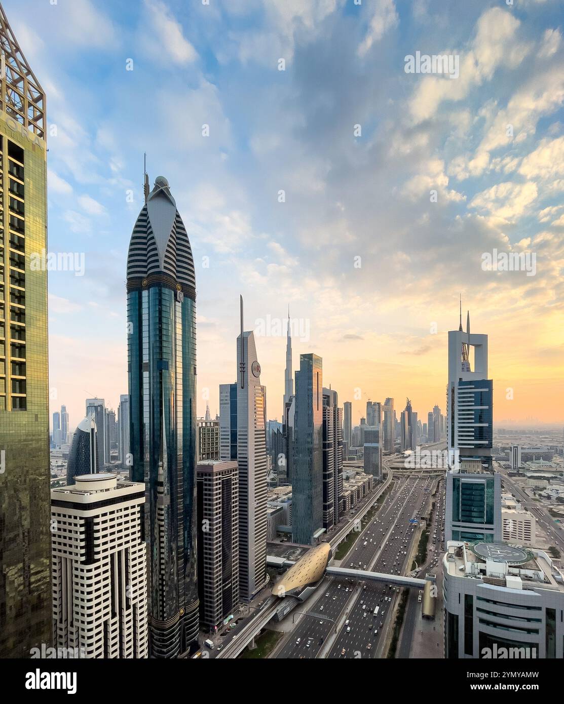 A view of the Dubai skyline at sunset Stock Photo - Alamy
