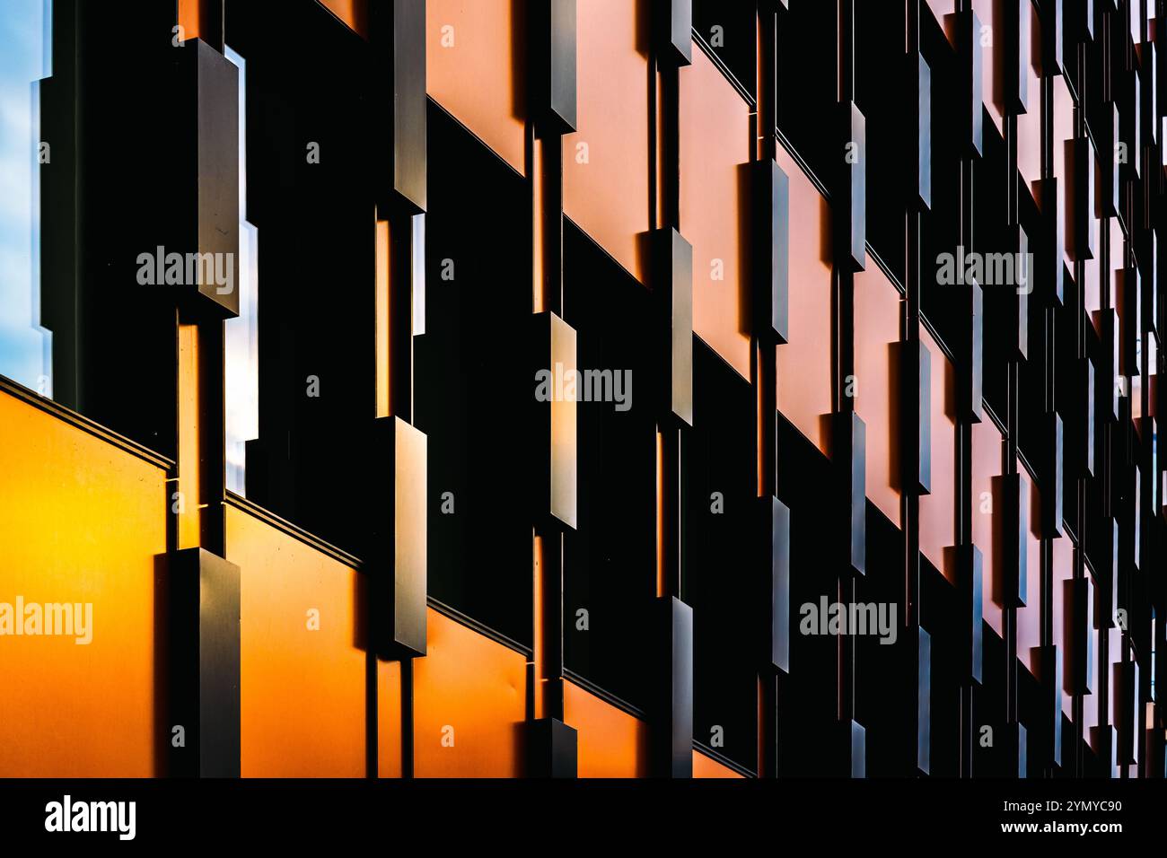 Modern Multicolored Architectural Facade with Repetitive Geometric Patterns Stock Photo