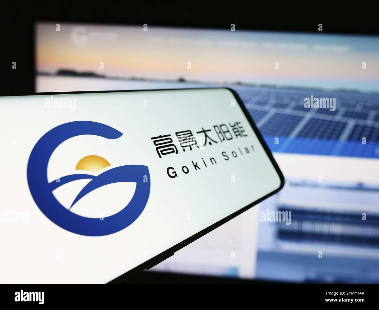 Stuttgart, Germany, 06-14-2024: Mobile phone with logo of Chinese photovoltaics company Gokin Solar Co. Ltd. in front of business website. Focus on ce Stock Photo