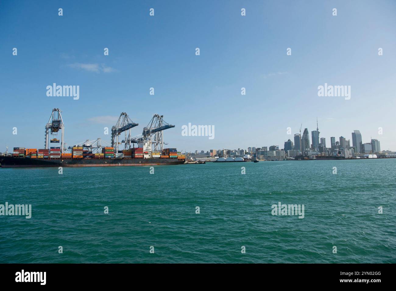 Container ship being loaded (or unloaded) in Auckland New Zealand Stock Photo