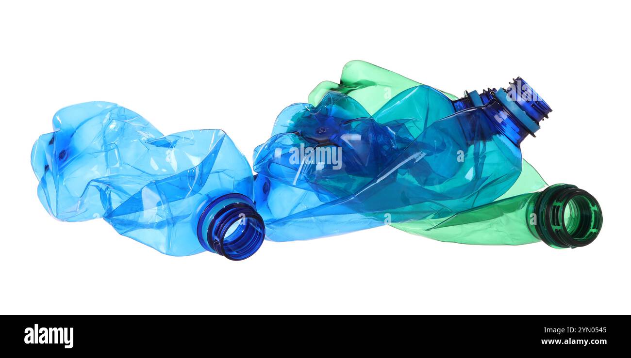 Crumpled empty plastic bottles isolated on white Stock Photo - Alamy
