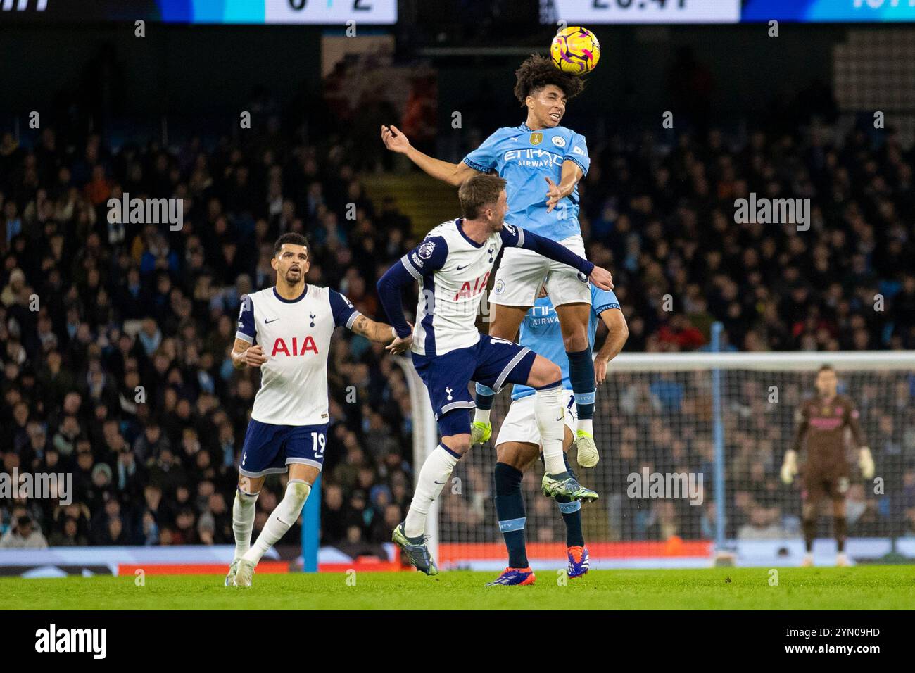 Rico Lewis #82 of Manchester City F.C. jumps for the ball during the Premier League match between Manchester City and Tottenham Hotspur at the Etihad Stadium, Manchester on Saturday 23rd November 2024. (Photo: Mike Morese | MI News) Credit: MI News & Sport /Alamy Live News Stock Photo