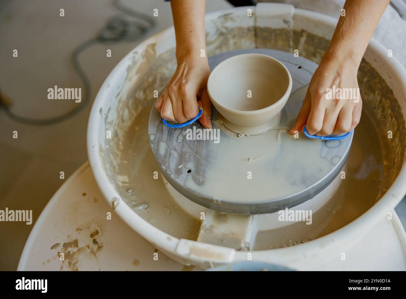 Pottery Making Crafting a Beautiful Ceramic Bowl on a Spinning Wheel