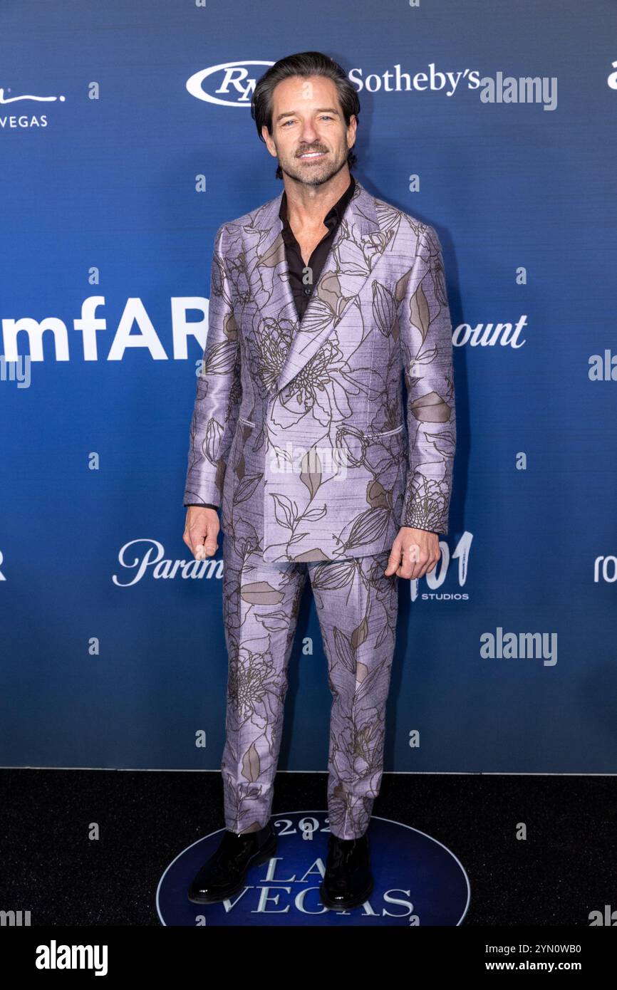 Las Vegas, USA. 22nd Nov, 2024. Ian Bohen attends the amfAR Las Vegas ...