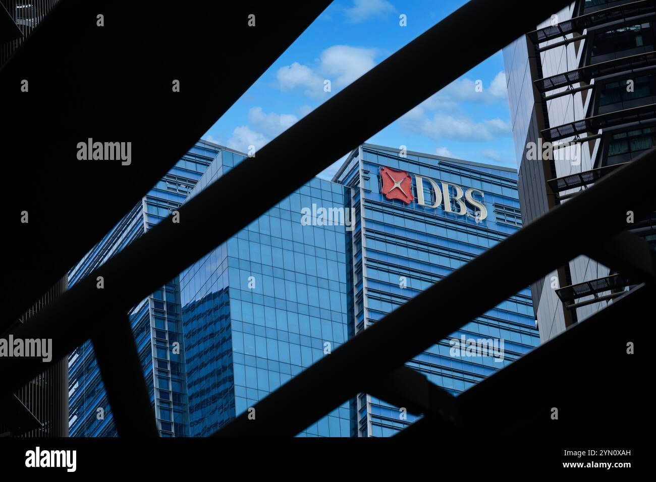 Exterior of the DBS Financial Building at Marina Bay including DBS Logo framed between the Marina Bay One Towers. Stock Photo