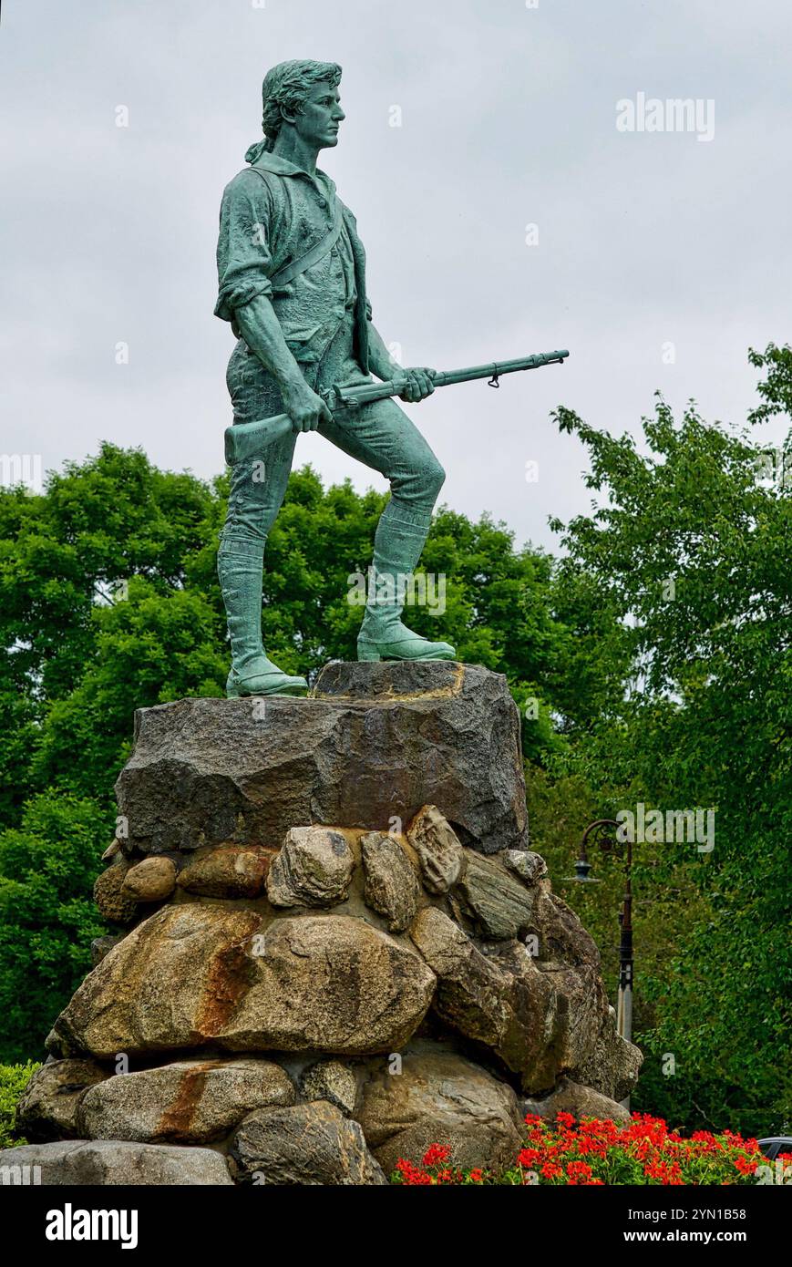 The 'Lexington Minuteman' sculpture by Henry Hudson Kitson in Lexington, Massachusetts, USA. honors the Minutemen from the American Revolutionary War. Stock Photo