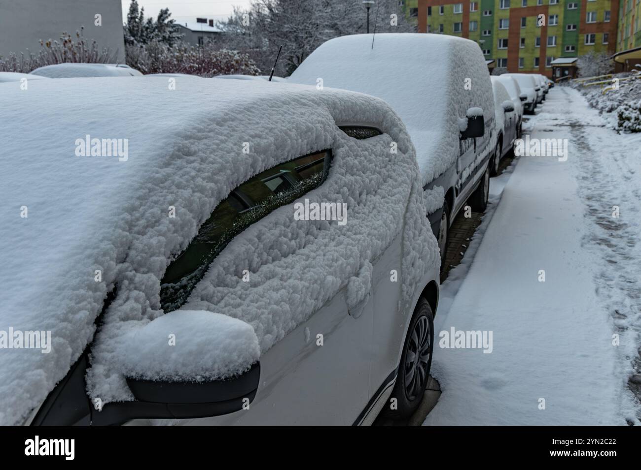 Preparing the car to go to work, clearing snow from the car, removing ice from the car Stock Photo