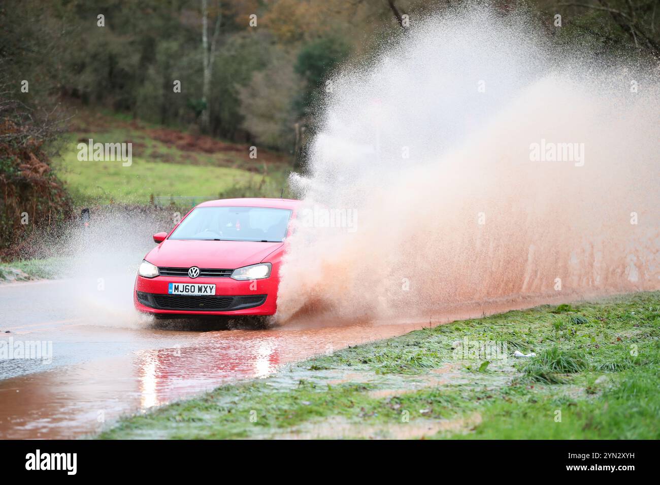 Kidderminster, Worcestershire, UK. 24th Nov, 2024. UK Weather: Vehicles encounter hazardous driving conditions on the A442 near Kidderminster, Worcestershire, as rainwater run-off creates spectacular puddles. Credit: Peter Lopeman/Alamy Live News Stock Photo