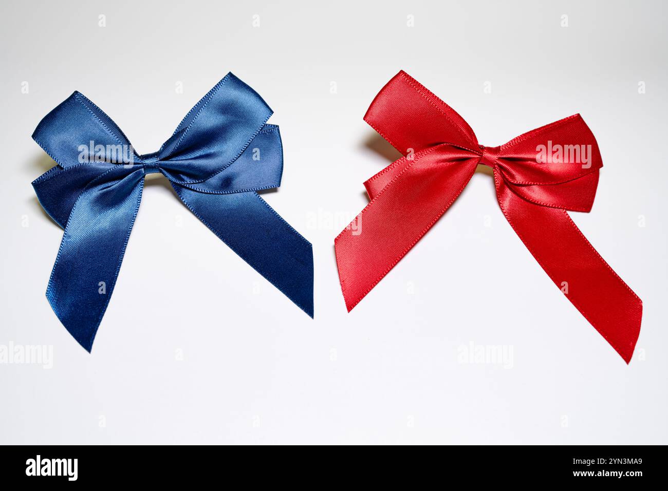 Two red ribbons isolated hi-res stock photography and images - Alamy