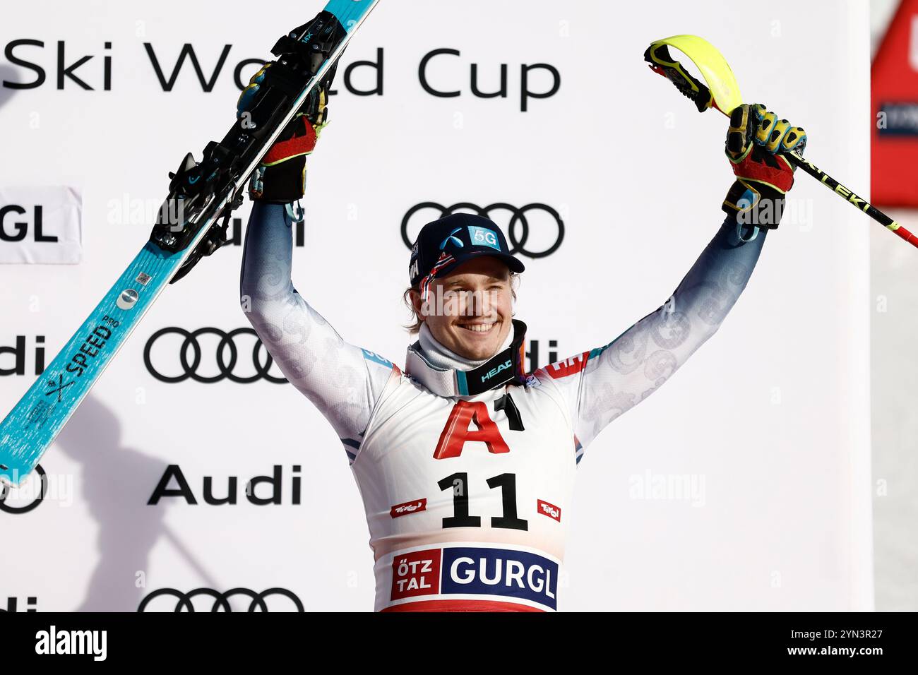 Norway's Atle Lie McGrath celebrates on the podium after taking third ...