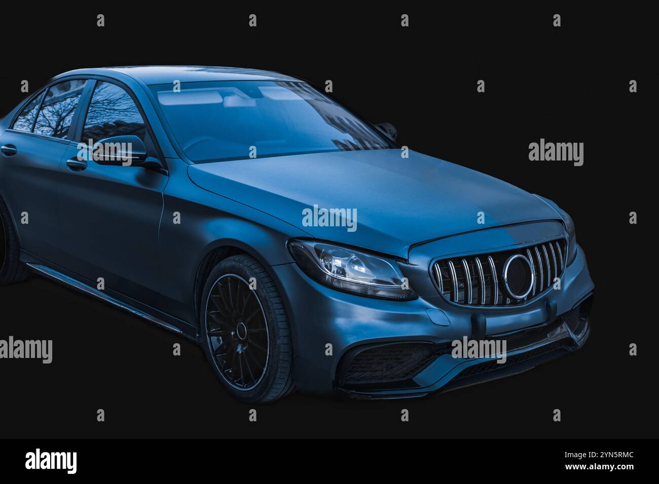 New Metallic blue luxurious spot car on black background, side view on modern elegant car. Fast sports car. Stock Photo