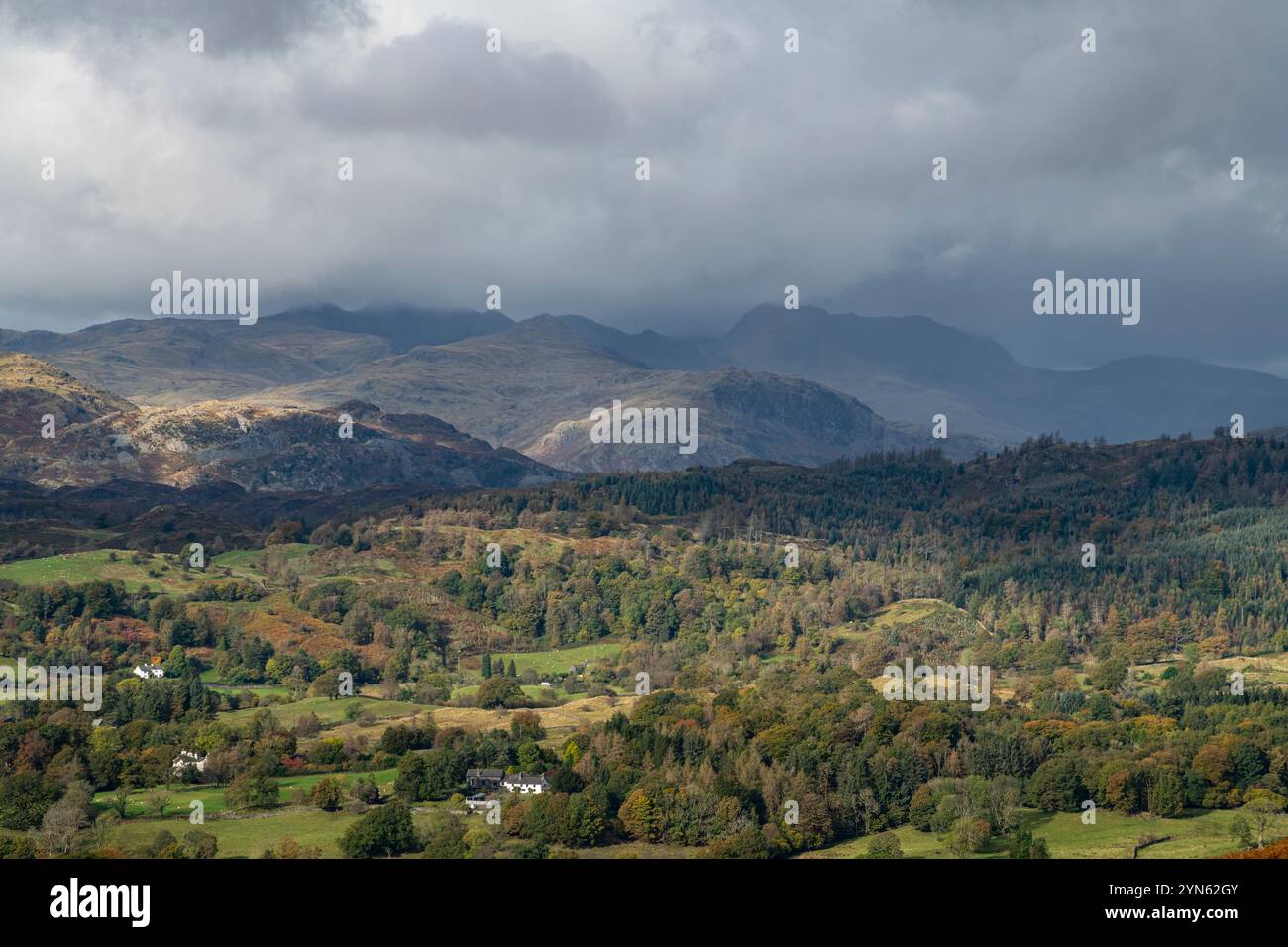 Rain clouds over the high fells of the Lake District seen from ...