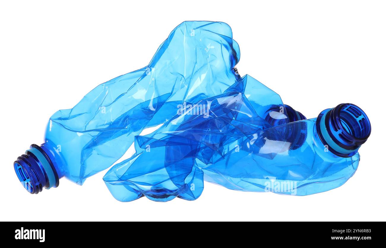 Crumpled empty plastic bottles isolated on white Stock Photo - Alamy