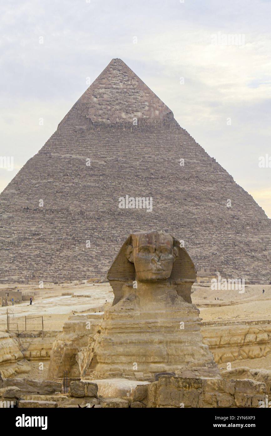 Sphinx sculpture and the Cheops pyramid in Giza in Egypt Stock Photo ...