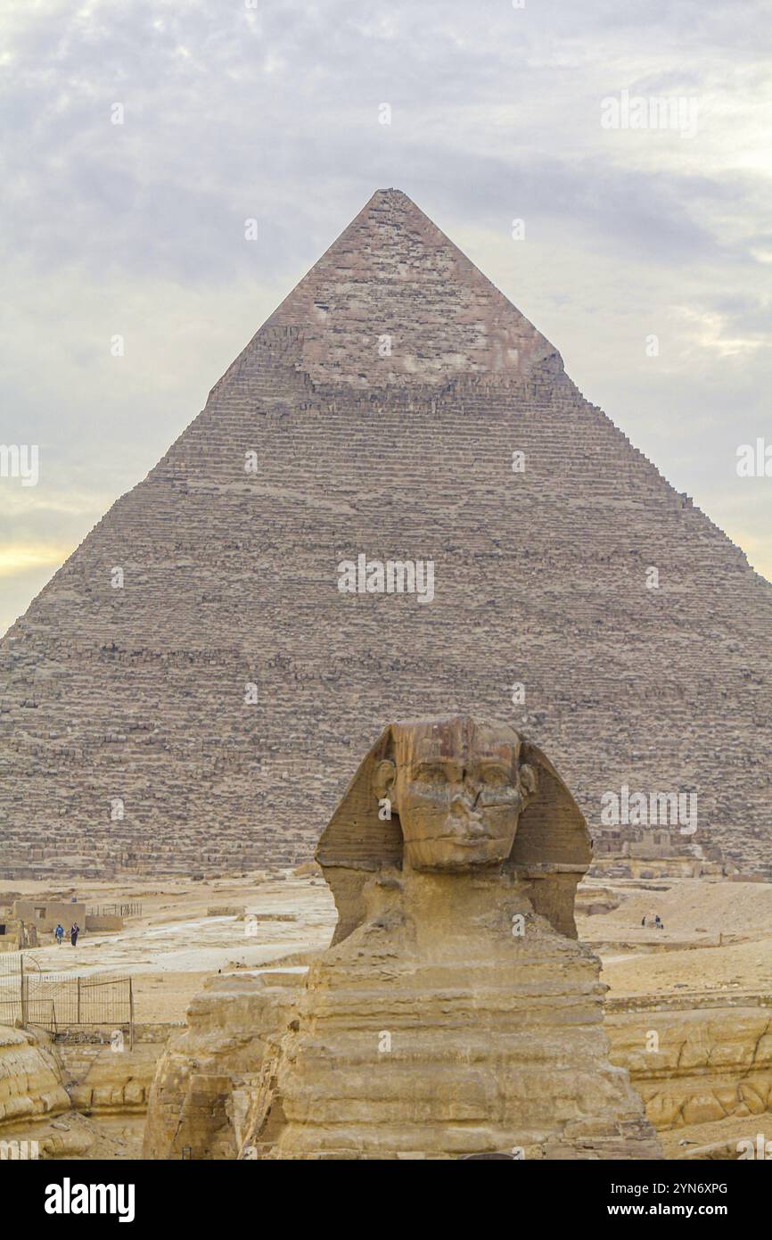 Sphinx sculpture and the Cheops pyramid in Giza in Egypt Stock Photo ...