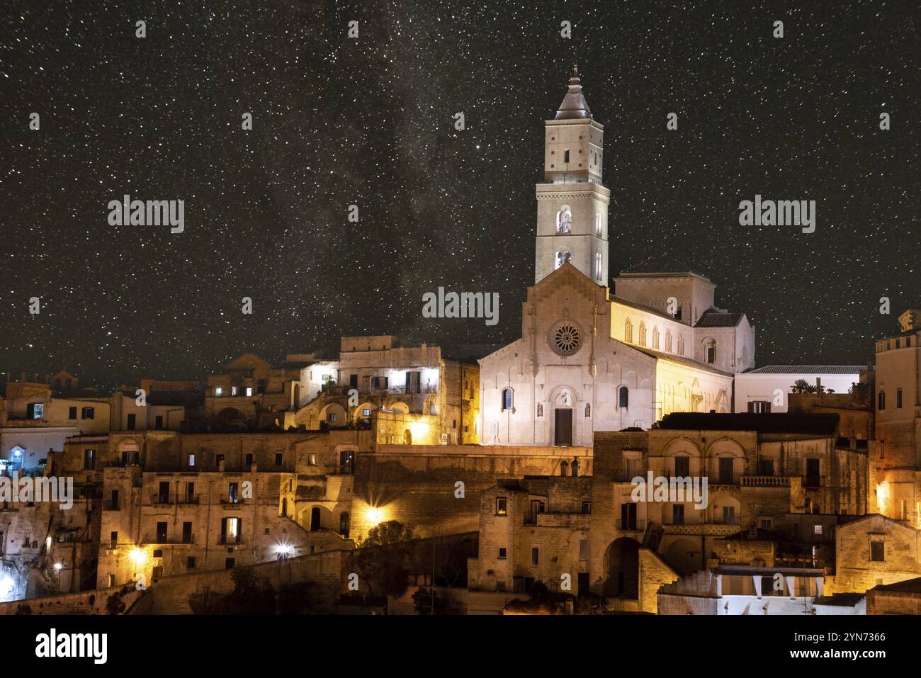 Scenic illuminated cathedral of Matera at night, Italy, Europe Stock Photo