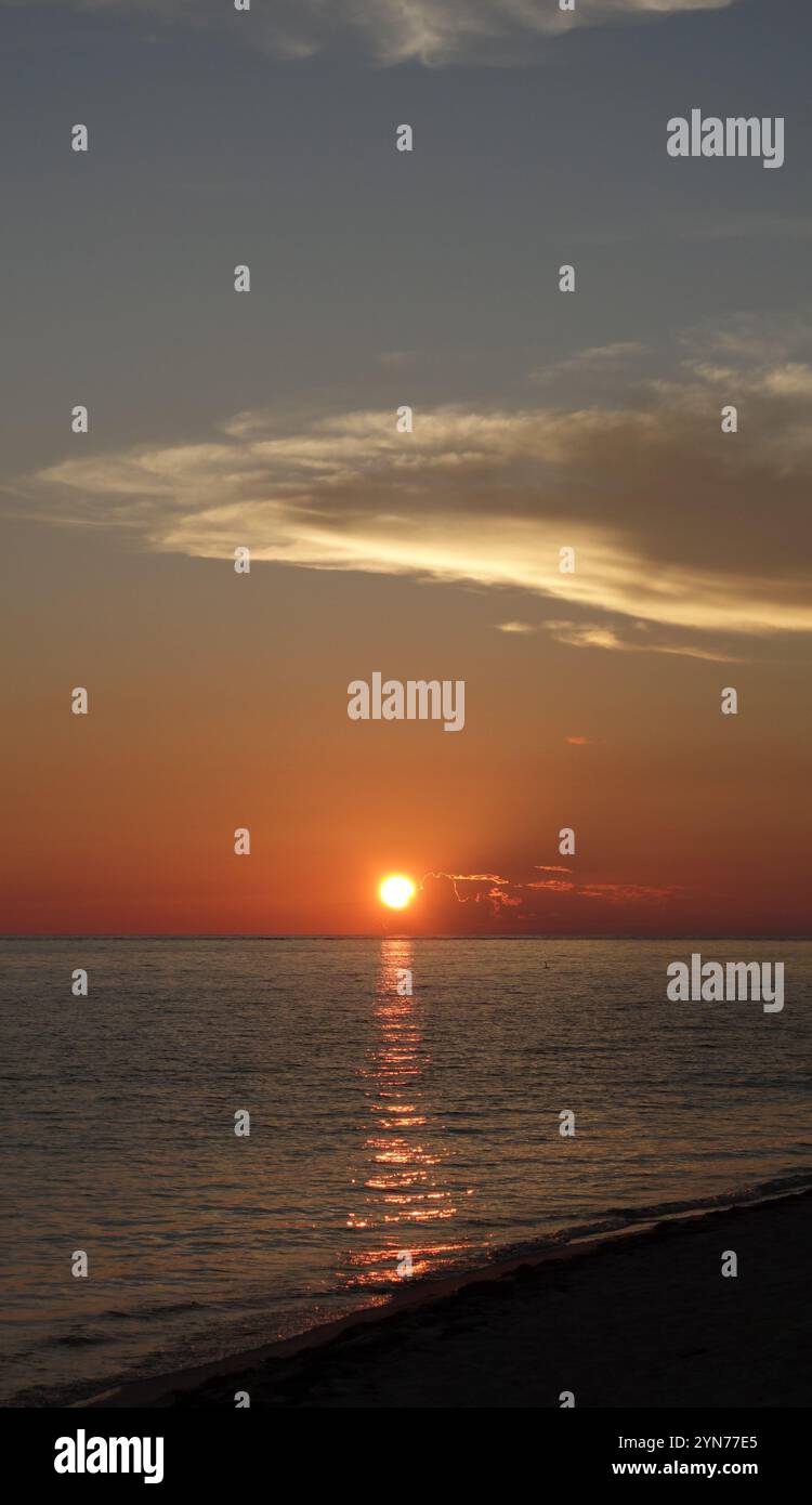 Bright yellow sun reflected in hi-res stock photography and images - Alamy